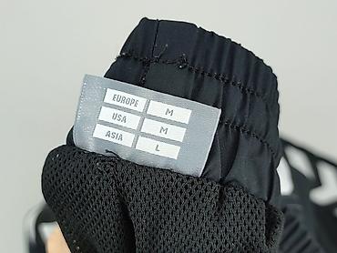 nirvana hm: Hummel, Spodnie dresowe dla mężczyzn, rozmiar M — 5