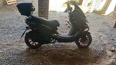 Унаа: Скутер ABS Moto (125–150 см³, вариатор) Черный городской скутер с — 2