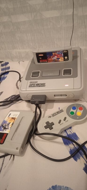 Nintendo Switch: Super Nintendo əla vəziyyətdədir,iki kaset üstündə verilir. Qiymət 300