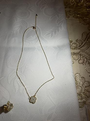Xupingdir!!! - Material: sarı tonlu metal zəncir - Kulon: dörd ləçəkli