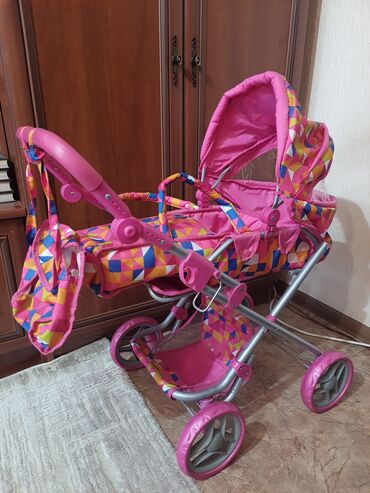 детский коляска игрушка: Продаю новую детскую коляску для кукол. В комплекте сумка-переноска
