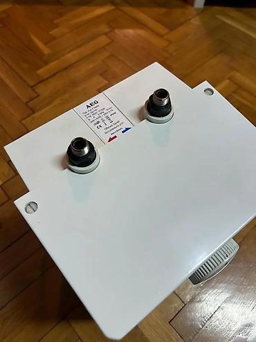 Ostale sanitarije: AEG protočni električni bojler – model Huz 5 Basis (E-Nr. 222167) - — 3