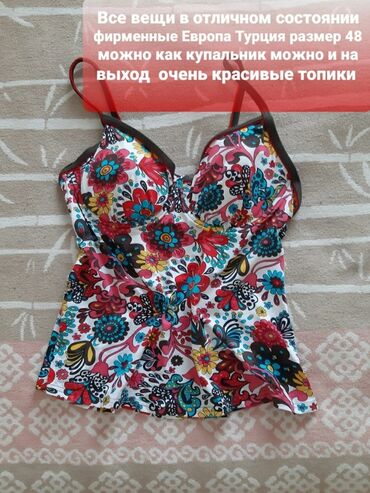 Другая женская одежда: Джинсовый комбинезон синего цвета с классическим дизайном. Модель — 14