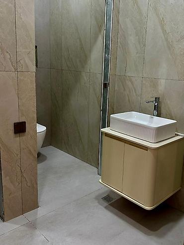 sabucda kiraye ev: Kooperasiya universitetinin yanında, əsas yola baxan, ümumi sahəsi 103 — 7