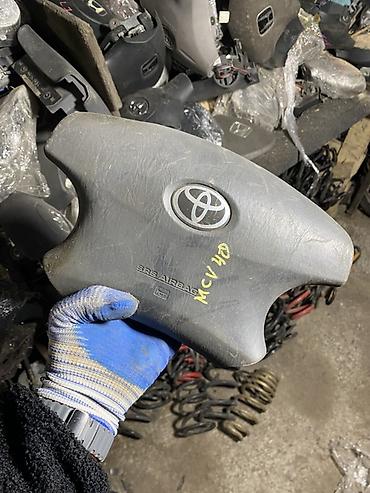 Детали салона: Подушка безопасности водительская (SRS Airbag) для руля Toyota. - — 1