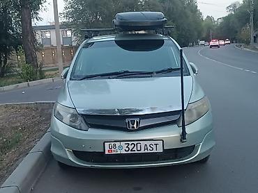 stag: Honda Fit: 2006 г., 1.5 л, Вариатор, Бензин, Универсал — 6