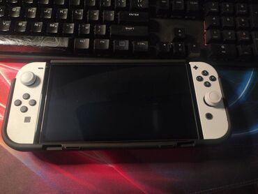 NES Classic: Nintendo switch oled. Konsol mukemmel veziyyetdedir, hec bir problemi