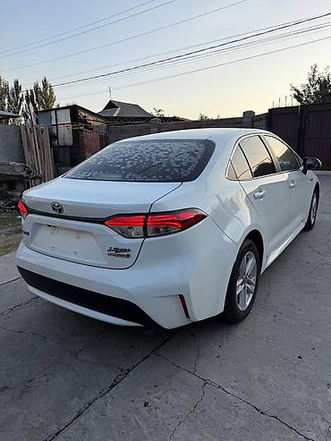 gac aion s 2021: Toyota Corolla: 2022 г., 1.8 л, Вариатор, Гибрид, Седан — 6