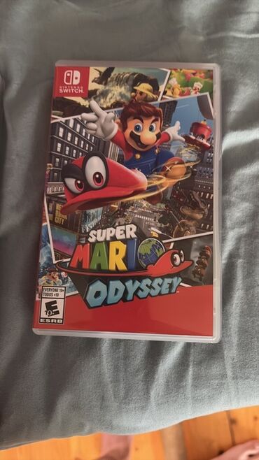 бу машинка стиральная: Nintendo Switch üçün Super Mario Odyssey oyunu. Bu oyun hər yaşda olan