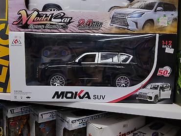 Игрушки: Радиоуправляемая модель автомобиля MOKA SUV - Масштаб: 1:12 - Частота — 1