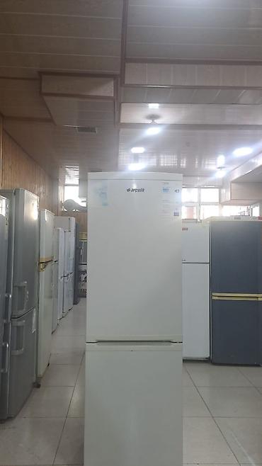 ev telefonu borcu: Arçelik soyuducu təqdim olunur. Ağ rəngli, aşağı hissədə dondurucu — 2