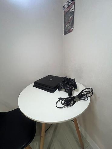 PS4 (Sony PlayStation 4): PlayStation 4 Pro (черный) Комплектация: - игровая консоль PS4 Pro — 2