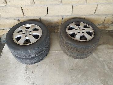 masin rolu: OPEL UCUN 15 LIK DIK TEKER. Satılır: 4 ədəd disklə birlikdə təkər — 1
