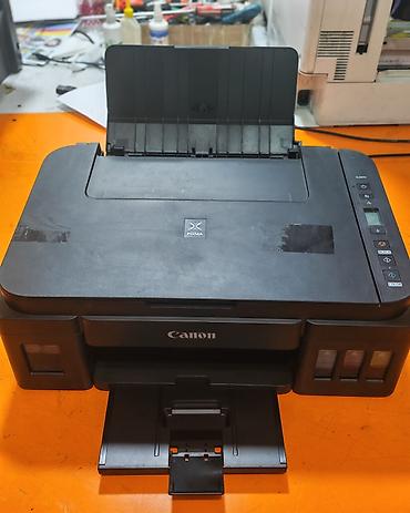 baku electronics printer: Canon2410 — 1
