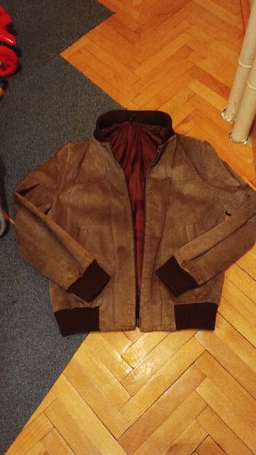braon sa zakrpama na laktovve: Kožna jakna.Odgovara 38 Vel.Ocuvana,jako malo korišćena.1500