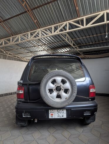 самая дорогая машина в кыргызстане: Kia Sportage: 1994 г., 2 л, Механика, Бензин, Внедорожник