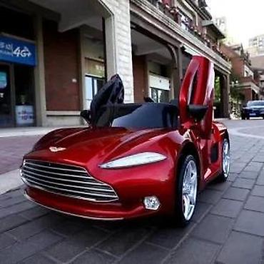 Sve za decu: Luksuzni električni auto za decu – Aston Martin 12V - Metalik braon — 9