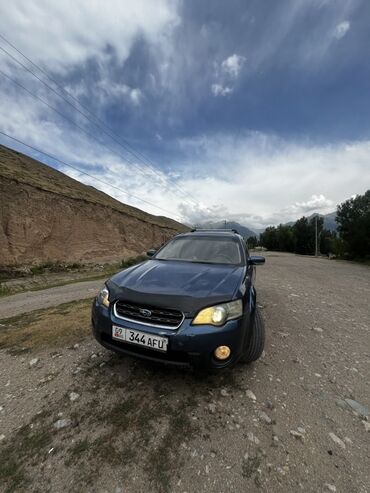 дом в колесах: Полноприводный универсал Subaru Outback синего цвета, оснащенный