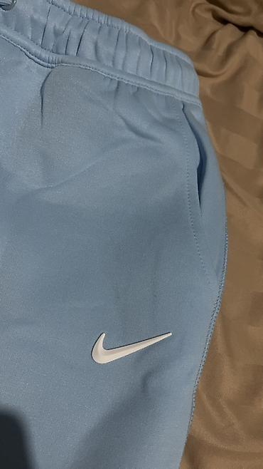 часы coros: Спортивные брюки Nike NOCTA - Цвет: светло‑голубой (ice blue) - — 2