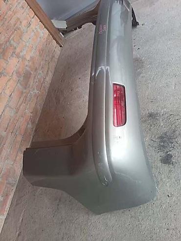 Branici: ZADNJI BRANIK ZLATNO SIVI ZA PEUGEOT 5008 OD 2009. DO 2013. GOD. | — 2