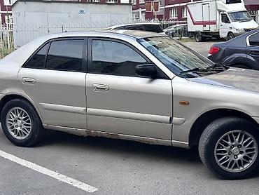 мтз89 1: Mazda 626: 2001 г., Механика, Седан — 2