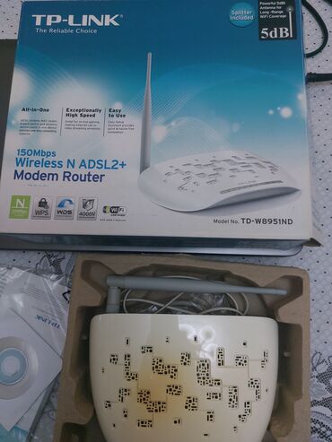 hard disk 250: Tp-link modem. Modemin modeli və aksessuarları hamsı şəkildə görünür