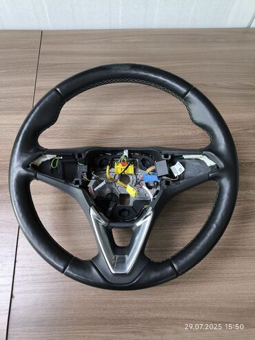 Работы по обшивке: Перетяжка рулей натуральной кожей и ЭКО кожа - Профессиональная — 8