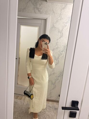 вечерние платья бишкек дордой: Элегантное молочно‑белое платье миди с акцентными бантами - Силуэт