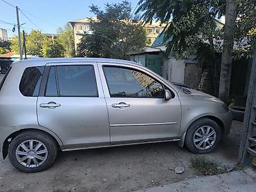 обмен на демио: Mazda Demio: 2004 г., 1.4 л, Автомат, Хэтчбэк — 5
