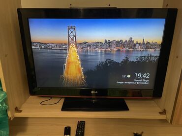 телевизоров компьютеров ноутбуков: Телевизор LG с диагональю примерно 32–37" (на подставке). Плоская