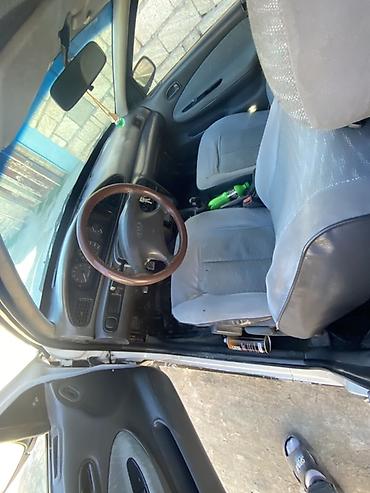 Kia: Kia Sephia: 1.5 l | 1997 il Sedan — 9