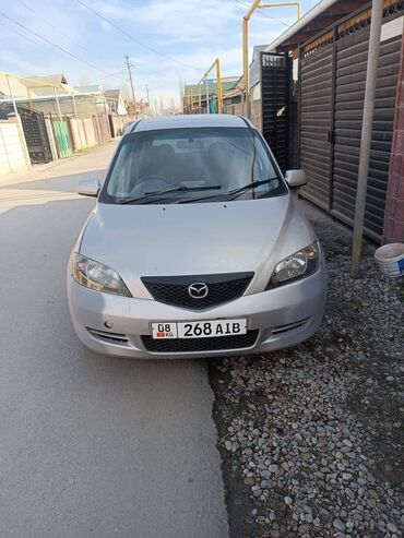 Mazda: Mazda Demio: 2004 г., 1.3 л, Автомат, Бензин