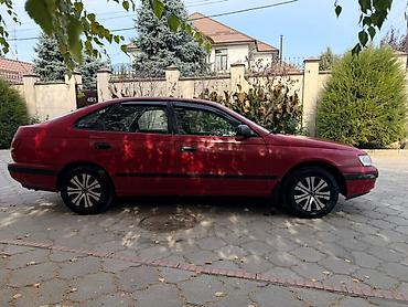 mini kuper: Toyota Carina E: 1992 г., 1.6 л, Механика, Бензин, Лифтбек — 9