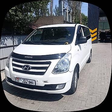 w210 e320: Hyundai Starex (H-1) белого цвета — вместительный пассажирский — 2