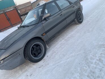 Mazda: Mazda 323: 1992 г., 1.8 л, Механика, Бензин, Хэтчбэк