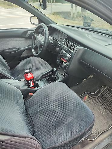 авто чегол: Toyota Carina E: 1995 г., 1.6 л, Механика, Бензин, Хэтчбэк — 8
