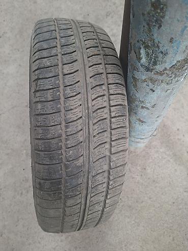 Колесо в сборе: шина 175/70 R13 на штампованном стальном диске at lalafo.kg Колесо в сборе: шина 175/70 R13 на штампованном стальном диске