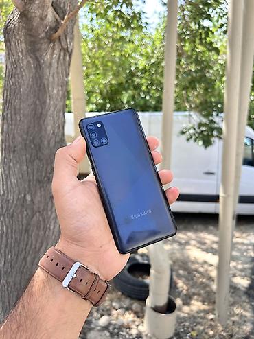samsung netbook: Samsung Galaxy A31, 64 GB, rəng - Göy, Barmaq izi, Düyməli, Sensor — 1