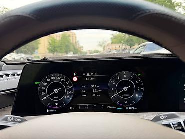 kaiyi e5: Kia K8: 2022 г., 1.6 л, Автомат, Гибрид, Седан — 9