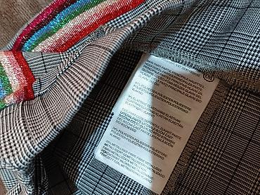 Ženske pantalone sa kariranim dezenom i svetlucavim bočnim prugama - — 2