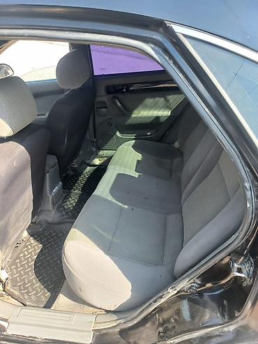 с номерами: Chevrolet Lacetti: 2009 г., 1.6 л, Механика, Бензин, Седан — 5