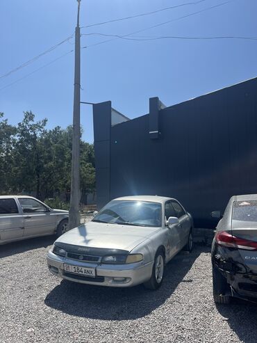 опель фронтера б: Mazda Cronos: 1993 г., 2 л, Механика, Бензин, Седан