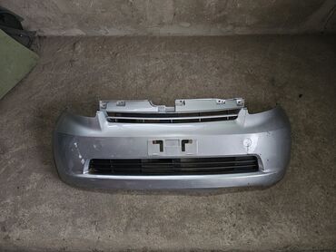 дайхацу: Передний Бампер Toyota 2004 г., Б/у, цвет - Серебристый, Оригинал