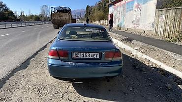 мото для путешествий: Mazda 626: 1993 г., 2 л, Механика, Бензин, Седан — 1