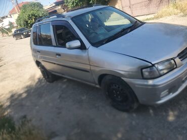 бишкек mercedesbenz c 180: Серебристый Mazda Demio