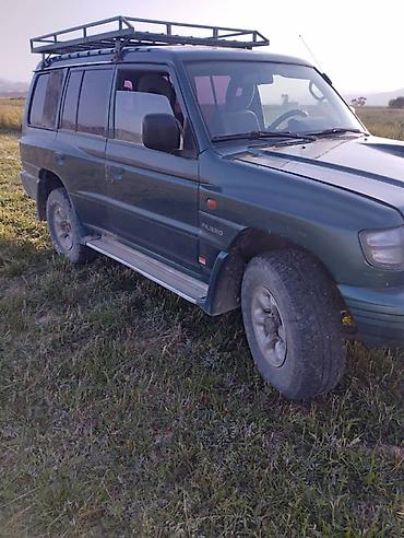 салон машины: Mitsubishi Pajero: 2003 г., 2.5 л, Механика, Дизель, Внедорожник — 3