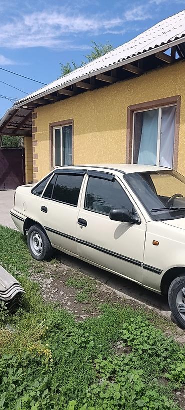 Транспорт: Daewoo Nexia: 2001 г., Седан — 2