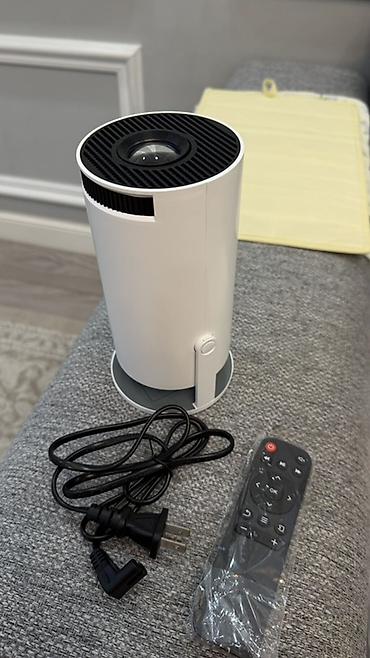 atem mini: Портативный проектор Ultra HD (HDR) Компактный цилиндрический — 1