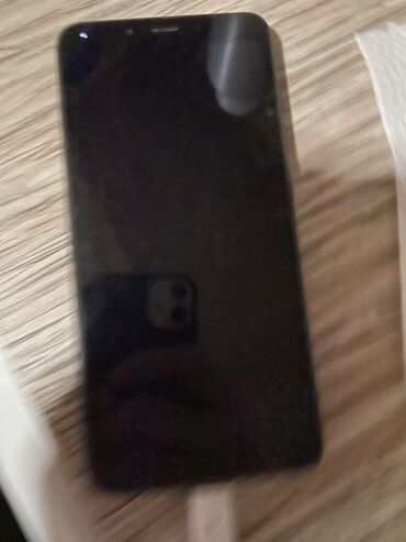 ustroistvo telefona flai: Xiaomi Redmi 6A, 16 ГБ, цвет - Черный