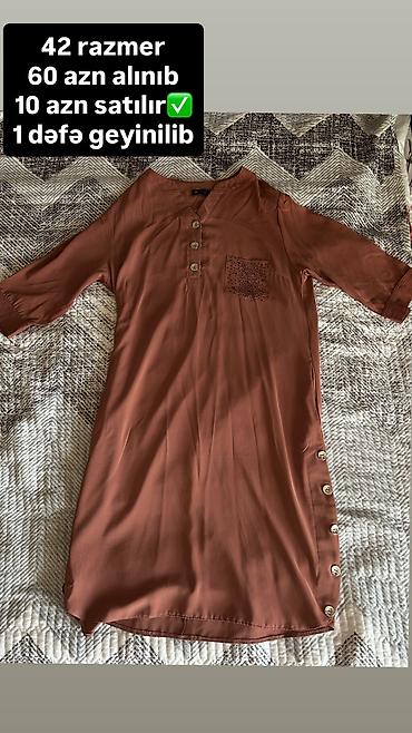 кожаная куртка бу: - Qadın tunik/kofta - Rəng: kərpic-qəhvəyi - Razmer: 42 - Model: Yarım — 1